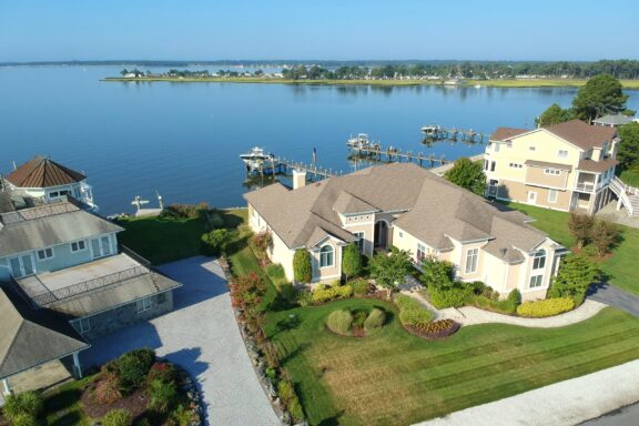 Luxury homes line the water at Rehoboth Beach in Sussex County, Delaware.