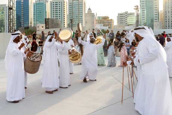 Traditional Music Performance at Cultural Festival Emiratis celebrating Al Hosn Festival, an annual cultural event in Abu Dhabi