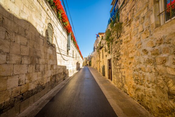 A quiet street in the Armenian Quarter, showcasing the blend of tradition and vibrancy in Jerusalem's Old City