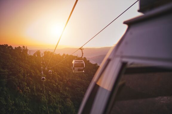 Cable Car at Sunset Cable Cars Leading to Avila National Park