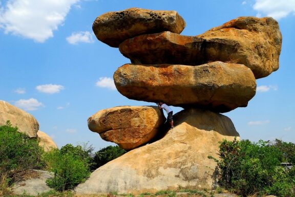 Stacked Balancing Rocks Against Sky The Balancing Rocks in Harare, which process of forming these took over 2 billion years