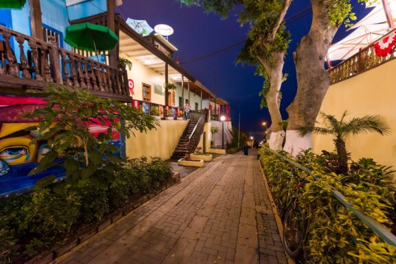 Evening in Barranco District with Colorful Buildings and Street Art Barranco District, famous for its bohemian charm, home to artists, musicians, and Lima's vibrant nightlife