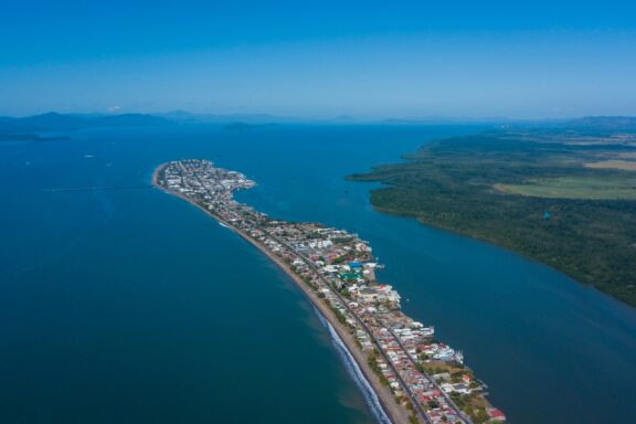 An aerial view of Puntarenas, Costa Rica extending into the ocean.