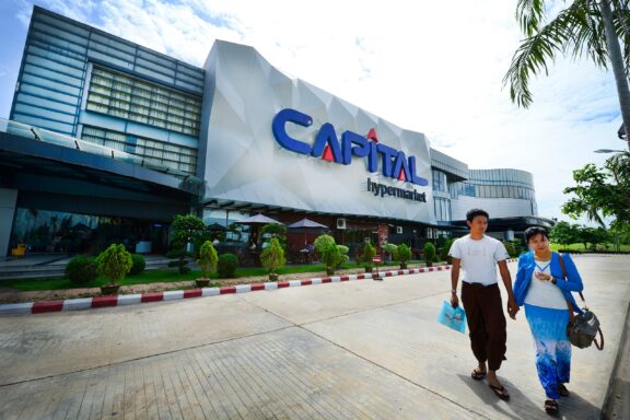 Shoppers Exiting Capital Shopping Mall The bustling Capital Supermarket in Naypyidaw's downtown area