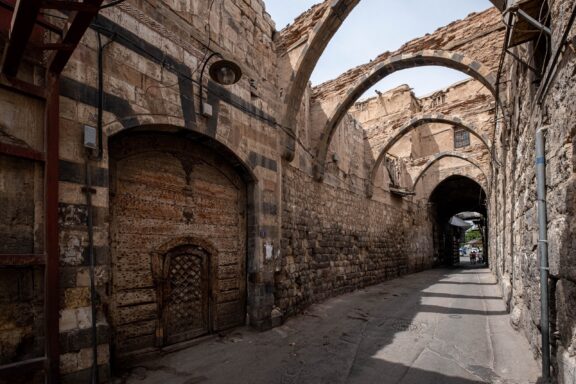 Narrow Alley in Old City of Damascus Historical oriental architecture in an alley in the Ancient City of Damascus