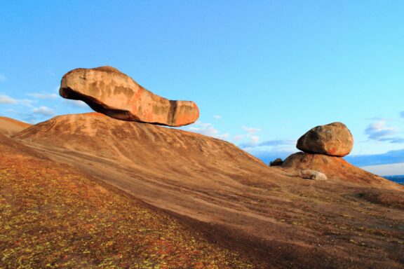 Balanced Rock Formations on a Hillside Large granite outcrops in Domboshava, shaped by centuries of erosion