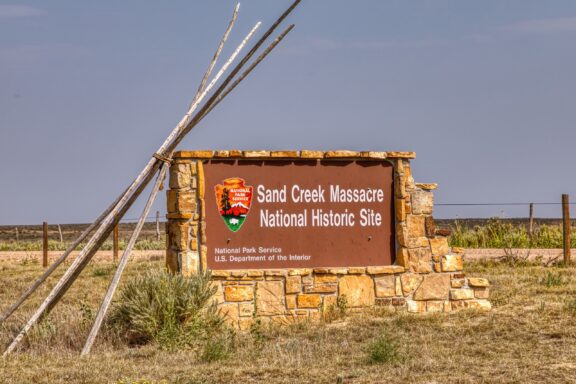 A sign marking the Sand Creek Massacre National Historic Site near Eads, Colorado.