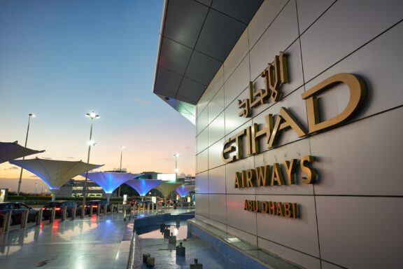 Etihad Airways Signage at Airport Terminal During Twilight Etihad Airways Headquarters, established in 2003