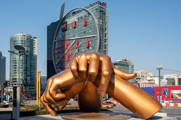Gangnam Style Hand Statue in Urban Setting Gangam Style Statue within the Gangnam District
