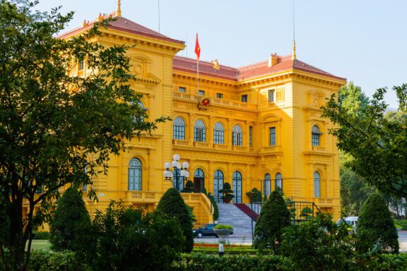 Yellow Presidential Palace in Hanoi Surrounded by Greenery The Presidential Palace in Hanoi, the former residence of Ho Chi Minh