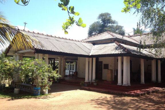Traditional Building Surrounded by Greenery The Kotte Archeological Museum, initially established as the E. W. Perera Memorial Museum in 1992