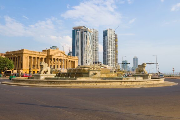 Cityscape with Fountain and Buildings The old Parliament Building in Sri Lanka, established in 1930