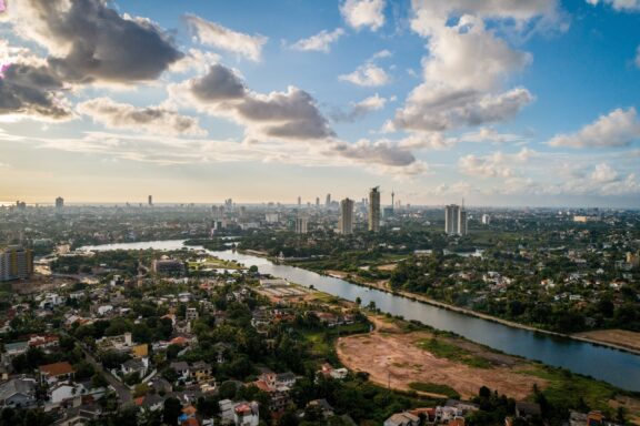 City Skyline with River at Dusk Skyline of Sri Jayawardenapura Kotte in the heart of the Colombo