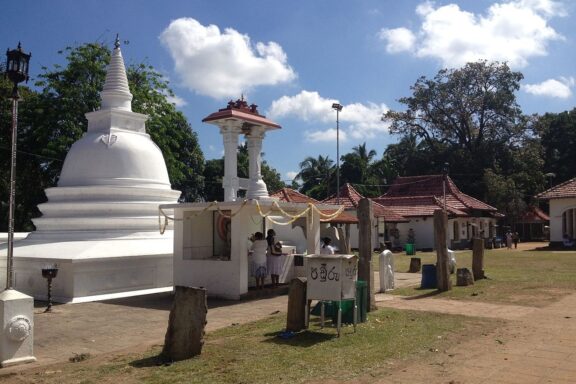 Buddhist Temple with Stupa and Visitors The Kotte Sri Naga Viharaya