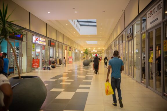 Shoppers Walking in Mall Corridor with Stores on Either Side Inside the East Park Mall, East Park Mall, Lusaka