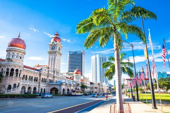 Sunny Day at Merdeka Square with Malaysian Flags Kuala lumpur malaysia october 15 2018: front view of the sultan abdul samad