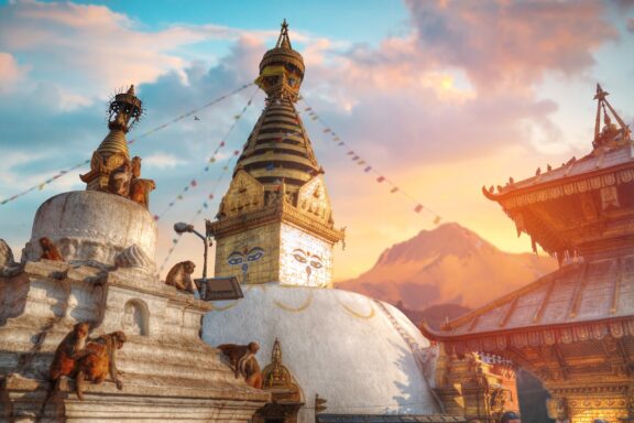 Monkeys at a Temple at Sunset Swayambhunath, known as the Monkey Temple, is a sacred Buddhist site