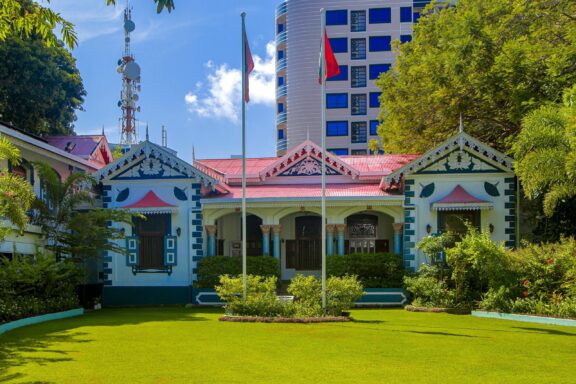 Colorful Building with Flags in Maldives Muliaage, the official residence of the President of the Maldives