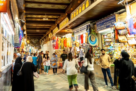 Bustling streets in Muscat city center, a melting pot of cultures and commerce