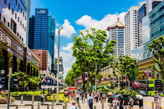 Bustling City Street with Pedestrians and Modern Buildings Orchard Road, a shopping paradise in Singapore