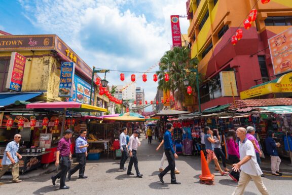 Bustling Street Market in Kuala Lumpur Chinatown (Petaling Street), known for its lively markets and authentic cuisine