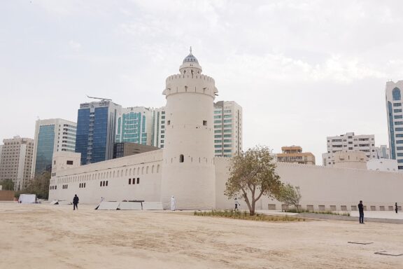 Qasr Al Hosn Fort with Modern Cityscape Background Qasr al-Hosn, also known as the White Fort, the oldest building in Abu Dhabi