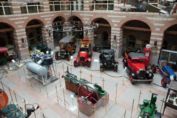 Interior View of Rahmi M. Koç Museum Displaying Vintage Vehicles and Machinery The Rahmi M. Koc Museum, offering a wide array of exhibits spanning from the beginning of the industrial age to the present