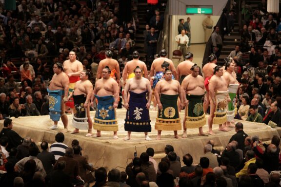 Sumo Wrestlers in Traditional Attire at Ryogoku Kokugikan Arena Ryogoku Sumo Hall, Tokyo's primary venue for sumo wrestling tournaments