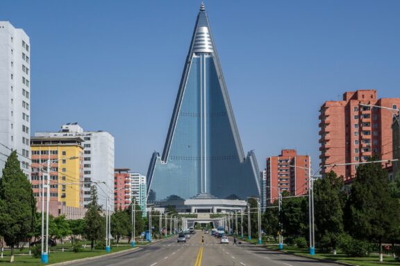 Ryugyong Hotel against the skyline Ryugyong Hotel, standing tall as a testament to ambition, complexity, and the challenges of modern construction in North Korea