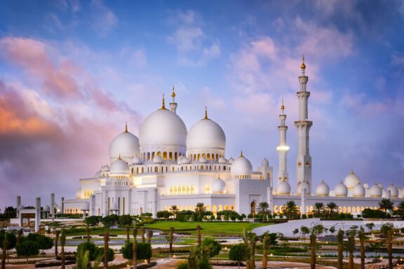 Dusk View of Sheikh Zayed Grand Mosque with Cloudy Sky Sheikh zayed grand mosque at dusk abu dhabi uae