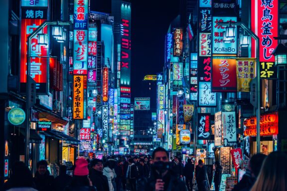 Neon Lights in Shinjuku's Kabukicho at Night Shinjuku's Kabuki-cho district, famous for its vibrant nightlife