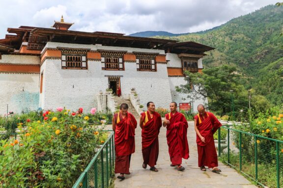 Monks at Simtokha Dzong in Thimphu, Bhutan, a fortress dating back to 1629