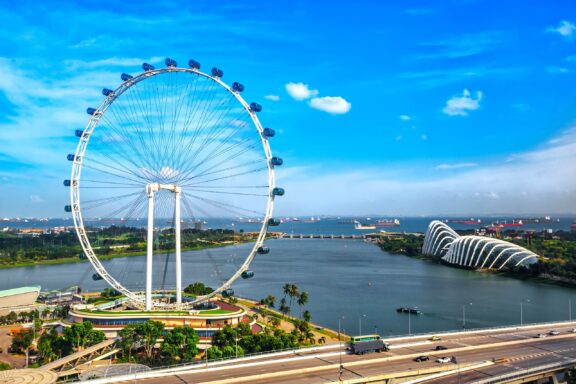 Aerial View of the Singapore Flyer Ferris Wheel The Singapore Flyer Ferris Wheel, offering a 360-degree view of Singapore's skyline
