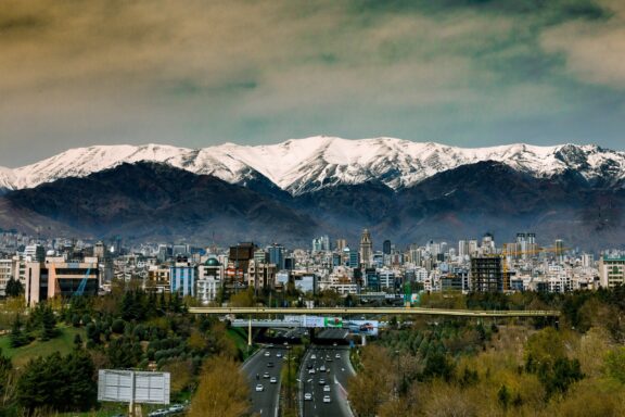 Tehran Cityscape with Alborz Mountains in the Background The grand landscape of Tehran, with the Alborz Mountains in the background