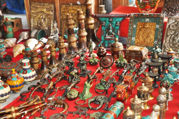 Assorted Handicrafts on Display at a Market Stall Traditional crafts from a vendor in Thimphu's Craft Bazaar