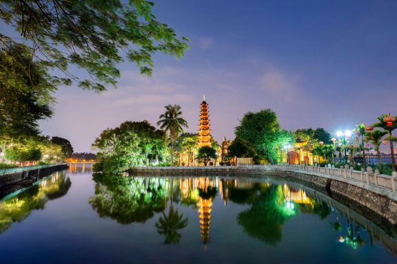Tran Quoc Pagoda by West Lake at Night Tran Quoc Pagoda, established in the 6th century during the reign of Emperor Ly Nam De