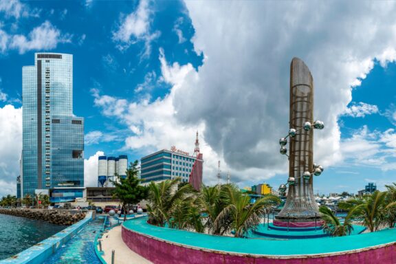 Tsunami Monument and City Skyline The Tsunami Monument, erected in memory of the victims of the 2004 Indian Ocean tsunami