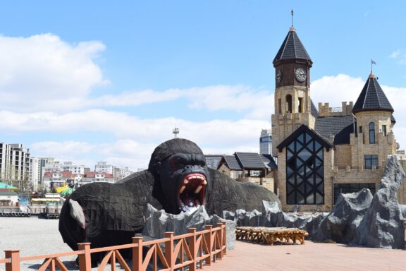 Amusement Park in Ulaanbaatar with Gorilla Statue and Castle Facade National Amusement Park in Ulaanbaatar