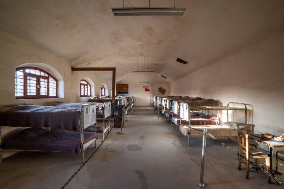 Interior View of Ulucanlar Prison Museum Dormitory with Bunk Beds The Ulucanlar Prison Museum, built in 1925, shortly after the establishment of the Turkish Republic.