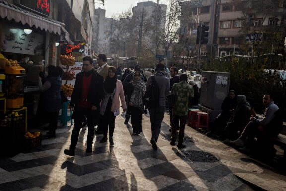 Pedestrians on Valiasr Street, Tehran Locals commute on Valiasr, the longest street in Tehran.