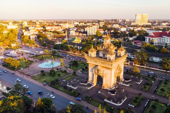 Aerial View of City with Monument and Streets at Sunset Landscape of Vientiane