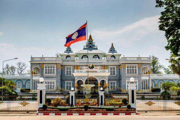 Vientiane Presidential Palace, with its striking French colonial design, stands as a symbol of Laos' historical connection to France 