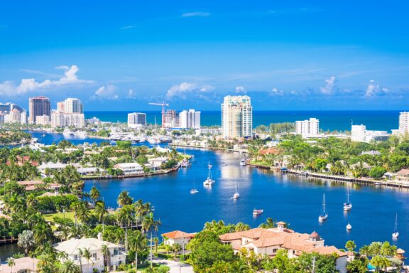 Panoramic View of Fort Lauderdale Skyline and Waterways in Florida An aerial view of sailboats in Fort Lauderdale Florida on a sunny day.