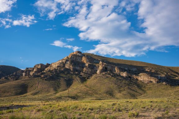 A view of the Arco Number Hill with white numbers painted on its side in Butte County, Idaho.