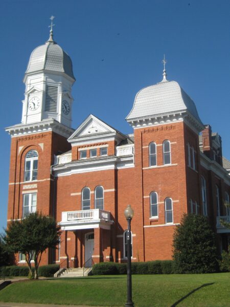 East Facade of the Taliaferro County Courthouse on a Sunny Day A low-angle view of the brick Taliaferro County Courthouse in Crawfordville, Georgia.