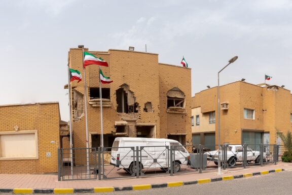 Damaged Building with Kuwaiti Flags Al-Qurain Martyrs' Museum