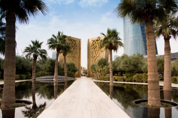 Pathway Leading to Monumental Structures in a Park Al Shaheed Park, the largest urban park in Kuwait