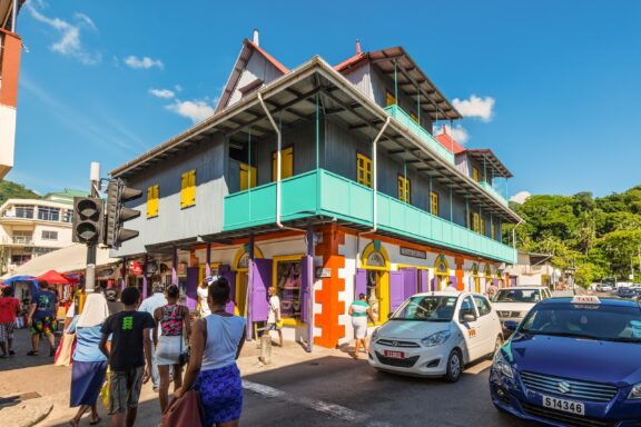 Colorful Building on Albert Street with Pedestrians and Cars Albert Street, a commercial heartbeat of Victoria