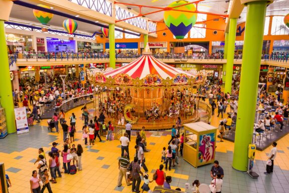 Indoor Carousel at a Busy Shopping Mall Albrook Mall, one of the largest shopping malls in Central America