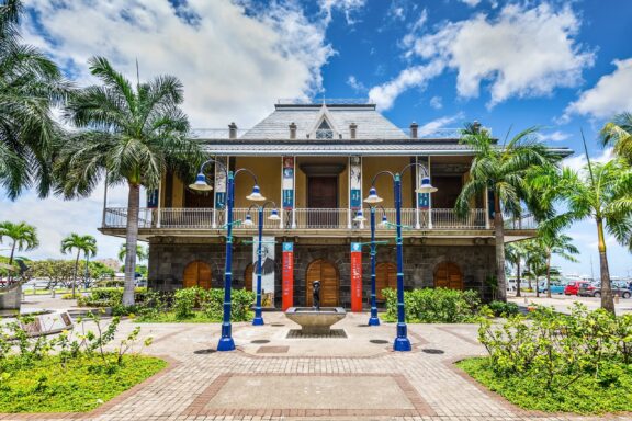 Colonial Style Building with Blue Pillars Blue Penny Museum, named after one of the world's rarest stamps